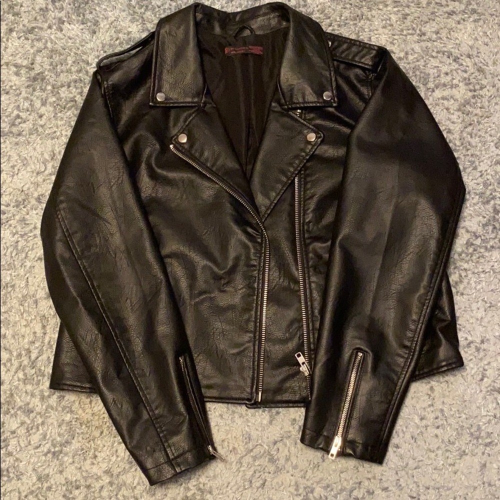 Slightly used fake leather jacket